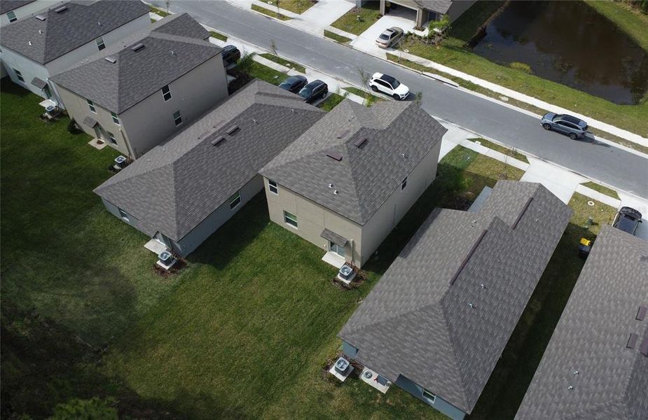 Front exterior of a new home in Saddle Creek Preserve: The Manors II, Lakeland, FL, highlighting curb appeal (Image 31).
