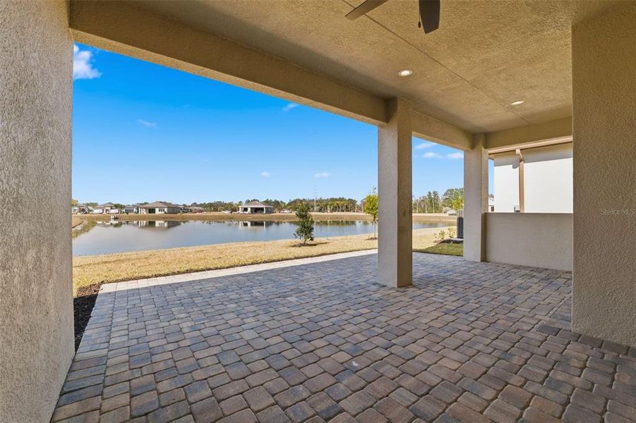 Exterior details and patio area of a home in Valencia Ridge, Wesley Chapel (Image 20).