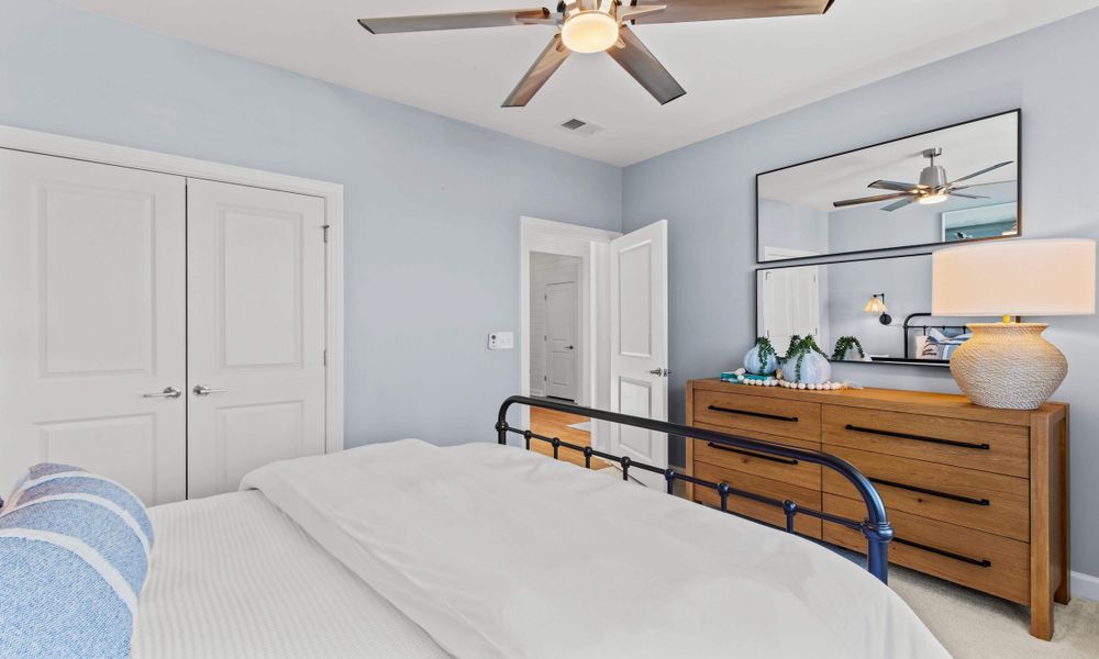Representative furnished interior of a home built from the The Longboard by Chesapeake Homes in Bridgewater - Shorehaven Village, Little River (Image 54).