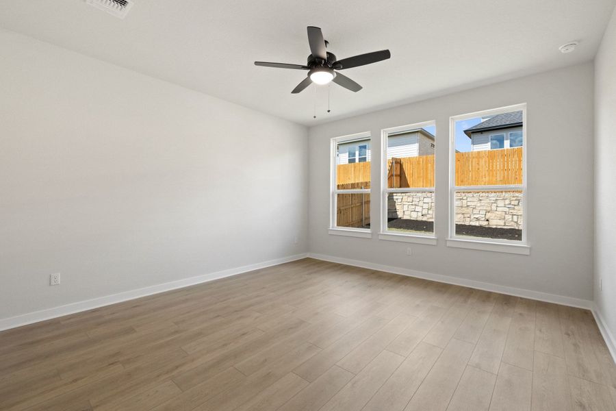 Spacious, unfurnished interior of a new home in Heritage, Dripping Springs (Image 36).