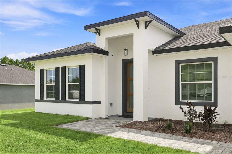 Exterior details and patio area of a home in , Ocala (Image 26).