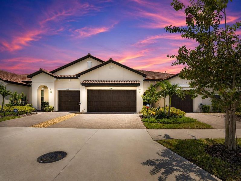 Front exterior of a new home in Southshore Bay Active Adult, Wimauma, FL, highlighting curb appeal (Image 27).
