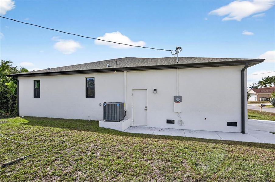 Exterior details and patio area of a home in , North Port (Image 32).