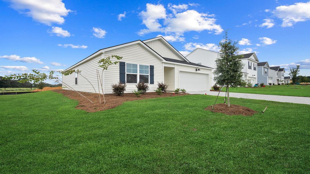 Front exterior of a new home in Holly Oaks, Statesboro, GA, highlighting curb appeal (Image 19). Front exterior of a new home in Holly Oaks, Statesboro, GA, highlighting curb appeal (Image 19).