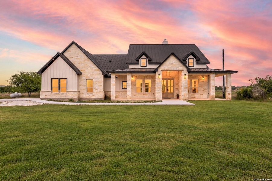 Front exterior of a new home in , Bandera, TX, highlighting curb appeal (Image 2). Front exterior of a new home in , Bandera, TX, highlighting curb appeal (Image 2).