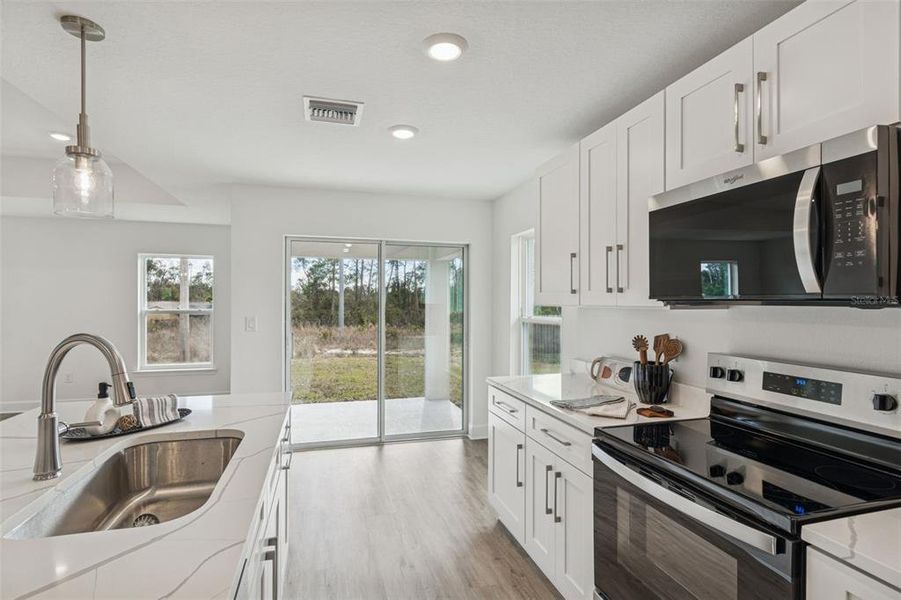Furnished interior view inside a new home in , Spring Hill (Image 13).