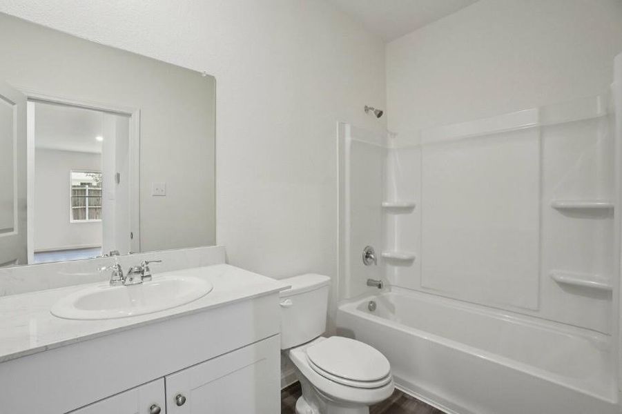 Furnished interior view inside a new home in Vacek Pointe, Richmond (Image 10).