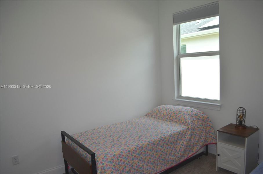 Furnished interior view inside a new home in , Port St. Lucie (Image 19).