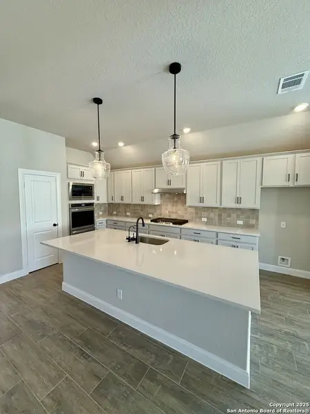 Furnished interior view inside a new home in Meyer Ranch – Legacy Series, New Braunfels (Image 3). Furnished interior view inside a new home in Meyer Ranch – Legacy Series, New Braunfels (Image 3).