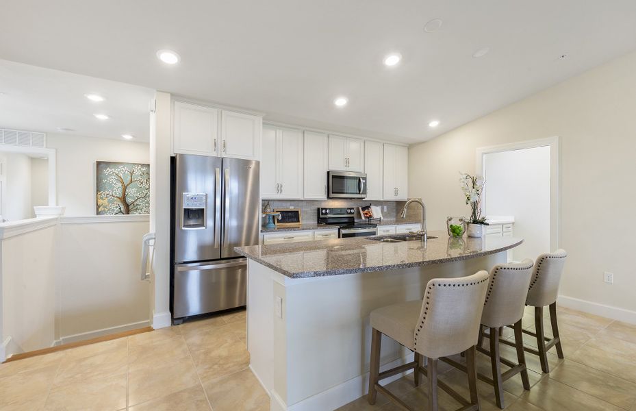Well appointed kitchen with stainless appliances