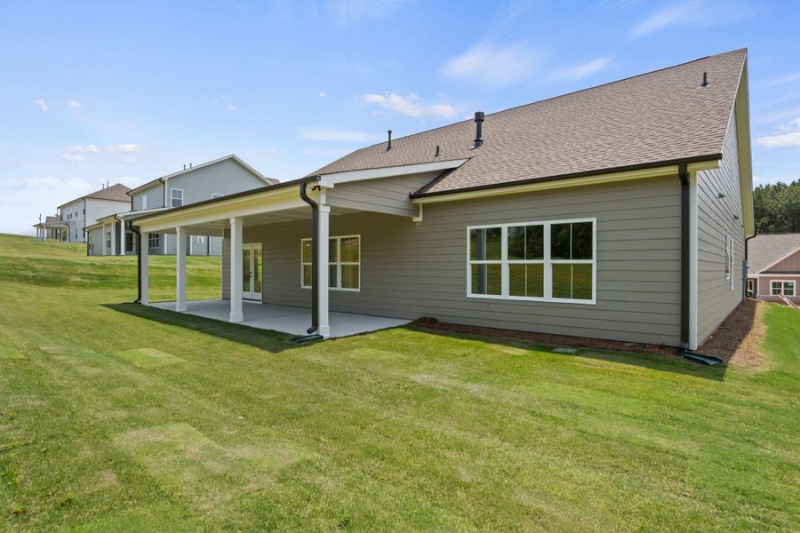 Exterior details and patio area of a home in Cherokee Knoll, Williamston (Image 16).