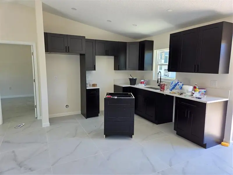 Furnished interior view inside a new home in , Avon Park (Image 4).