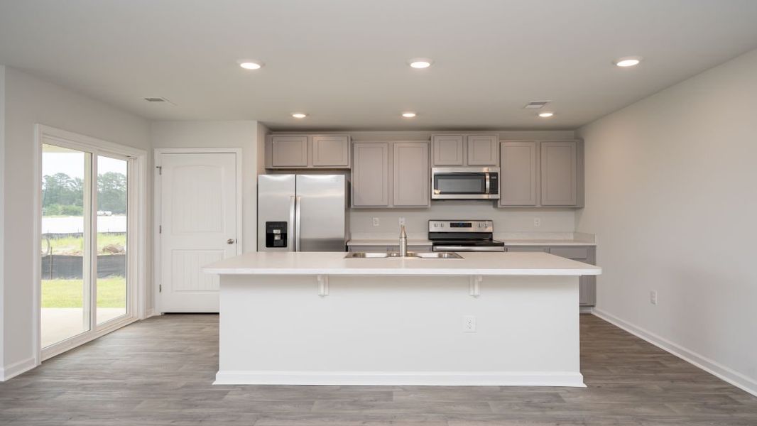 Representative furnished interior of a home built from the KERRY by D.R. Horton in Stanbury Creek, Supply (Image 6).