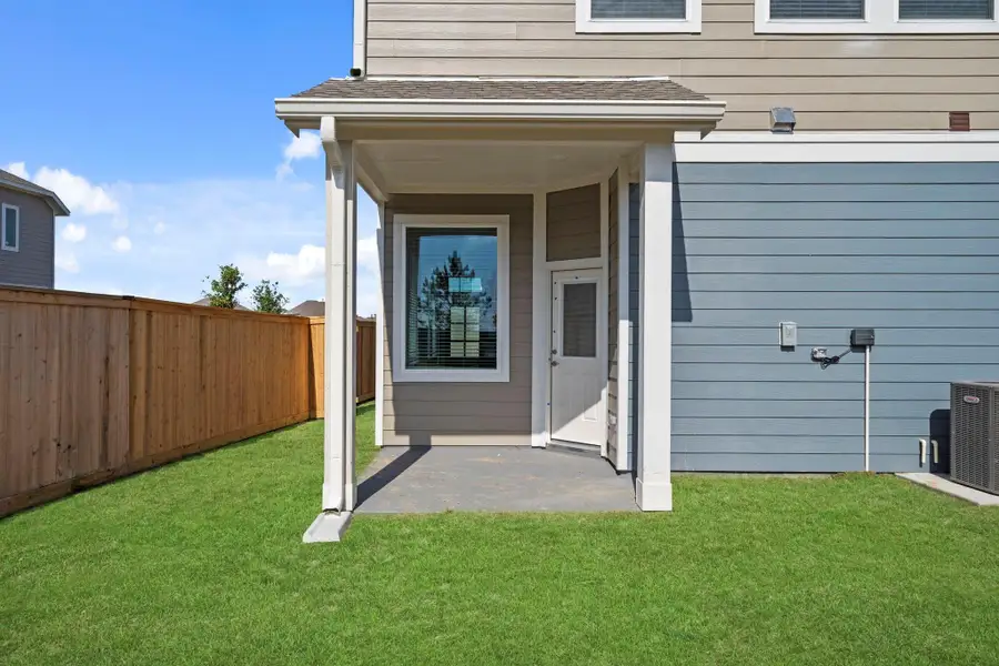 Exterior details and patio area of a home in Bridgeland, Cypress (Image 3).