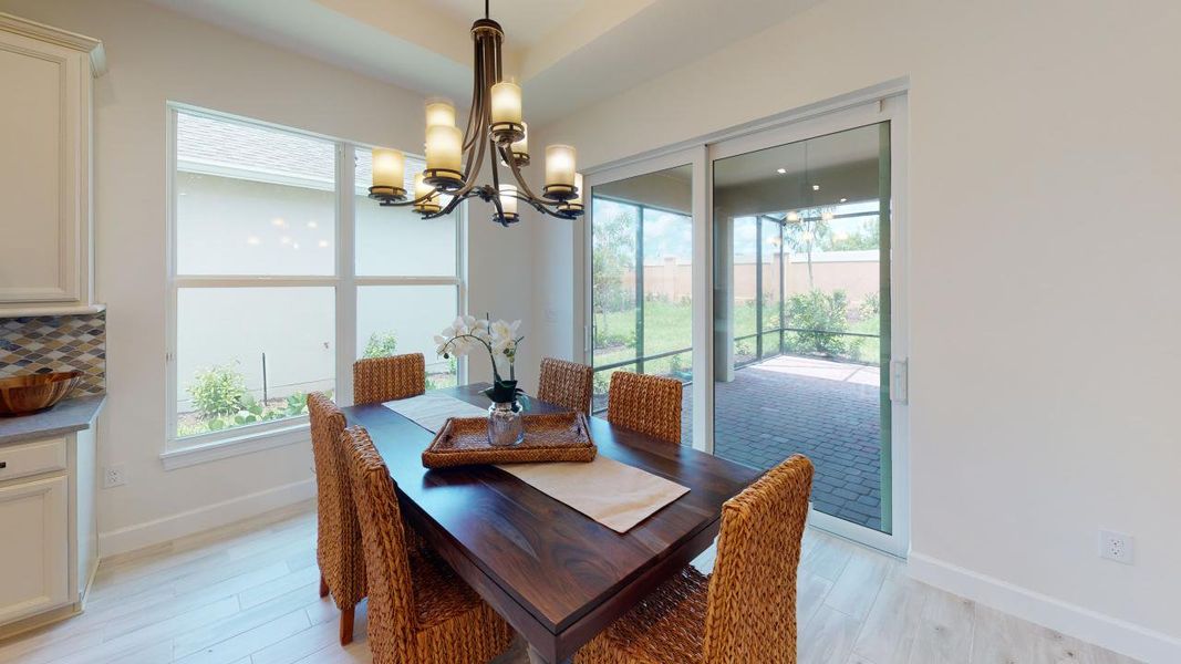 Furnished interior view inside a new home in Esplanade at Tradition, Port St. Lucie (Image 5).