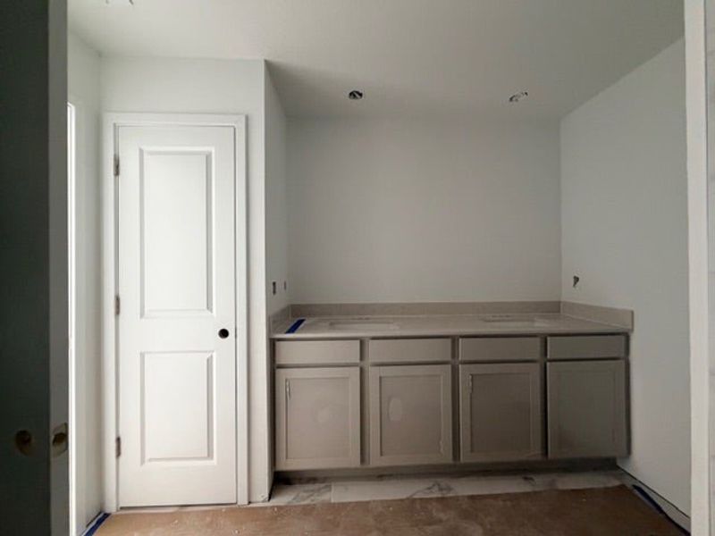 In-progress construction of a new home in Whaley Grove Townhomes, St. Cloud, FL (Image 13).