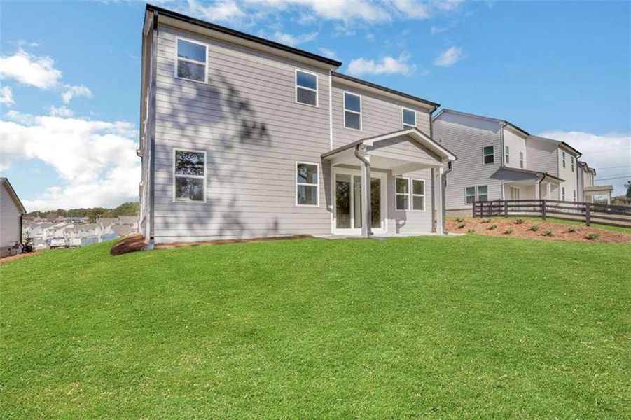 Exterior details and patio area of a home in The Paddocks at Doc Hughes, Buford (Image 25).