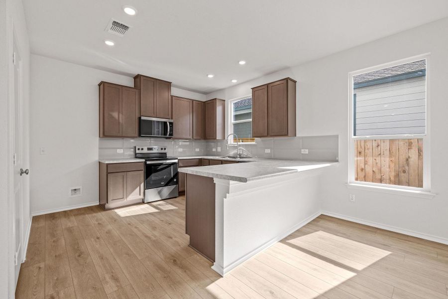 Furnished interior view inside a new home in Sonterra - Cool Water, Jarrell (Image 11).