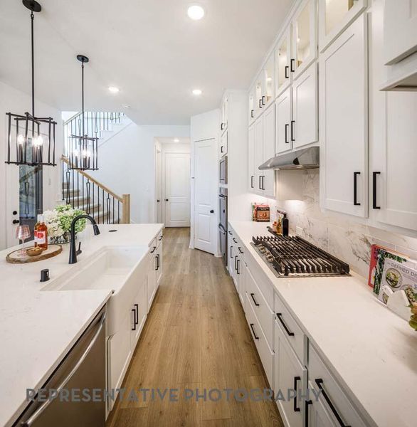 Furnished interior view inside a new home in Bridgeland, Cypress (Image 13).