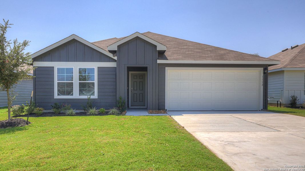 Front exterior of a new home in Navarro Fields, Seguin, TX, highlighting curb appeal (Image 1). Front exterior of a new home in Navarro Fields, Seguin, TX, highlighting curb appeal (Image 1).