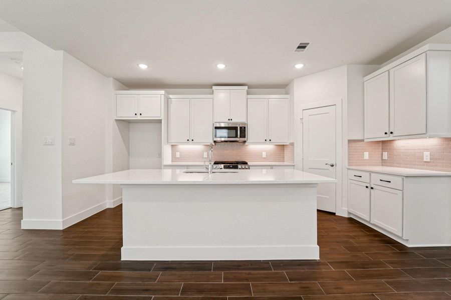Furnished interior view inside a new home in The Woodlands Hills, Willis (Image 4). Furnished interior view inside a new home in The Woodlands Hills, Willis (Image 4).