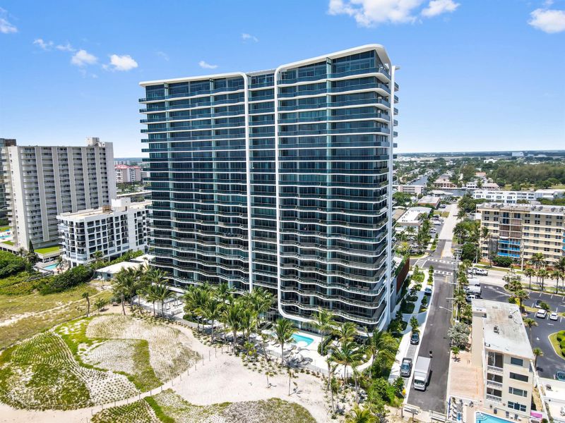 Front exterior of a new home in Casamar, Pompano Beach, FL, highlighting curb appeal (Image 27).