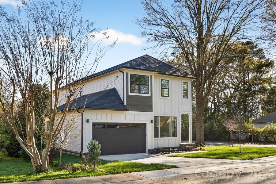 Front exterior of a new home in , Charlotte, NC, highlighting curb appeal (Image 24).