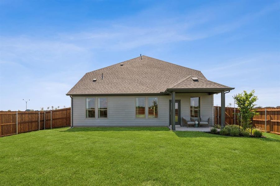 Backyard in the Winters home plan by Trophy Signature Homes – REPRESENTATIVE PHOTO