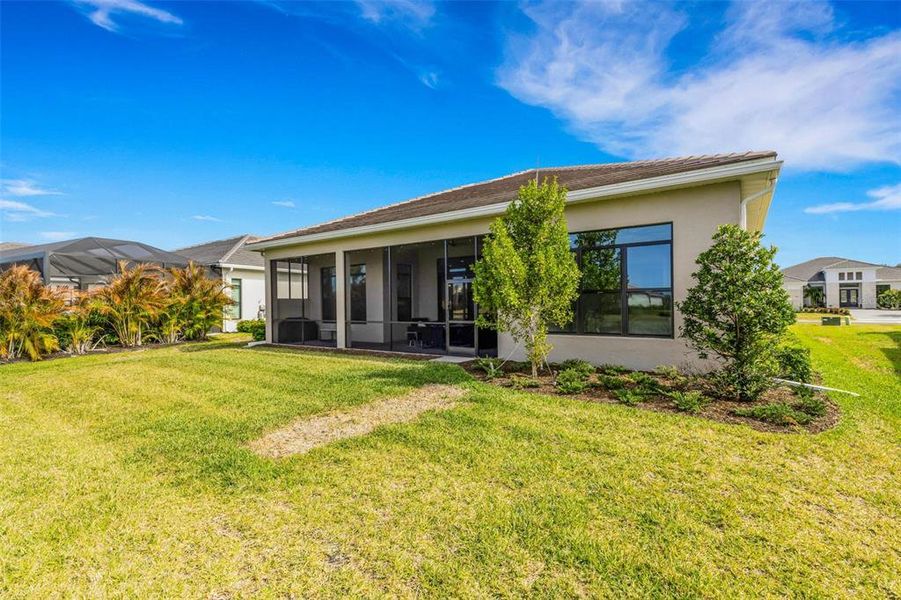 Exterior details and patio area of a home in Artistry Sarasota, Sarasota (Image 29).