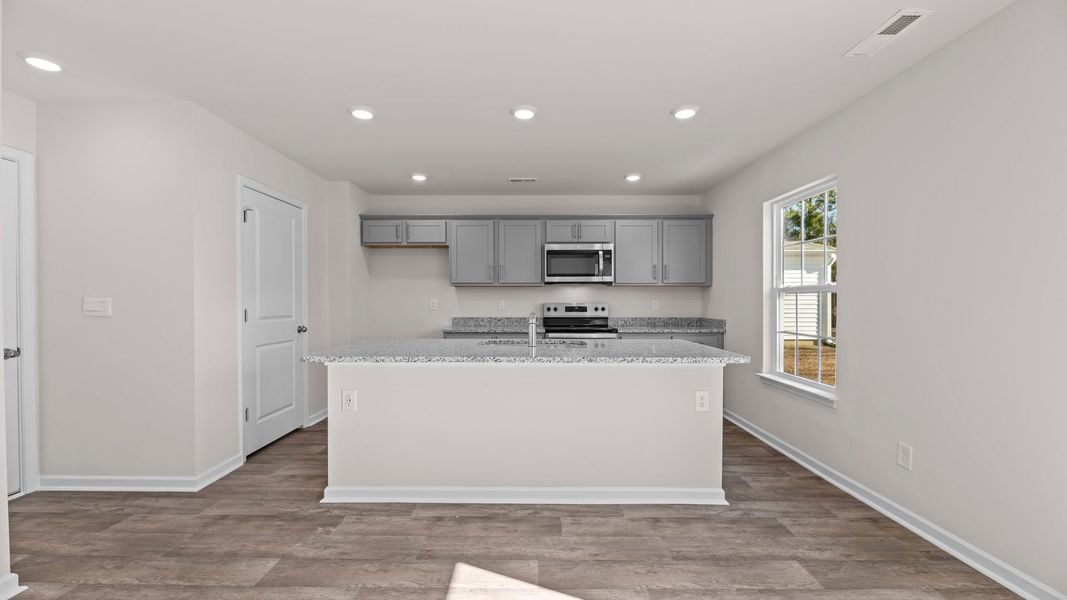 Furnished interior view inside a new home in Madeline Farm, New Bern (Image 3). Furnished interior view inside a new home in Madeline Farm, New Bern (Image 3).