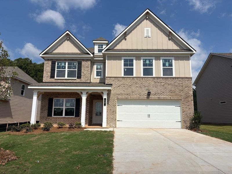Front exterior of a new home in Greenefield, Cartersville, GA, highlighting curb appeal (Image 1). Front exterior of a new home in Greenefield, Cartersville, GA, highlighting curb appeal (Image 1).