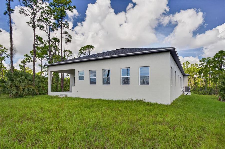 Exterior details and patio area of a home in , Port Charlotte (Image 32).
