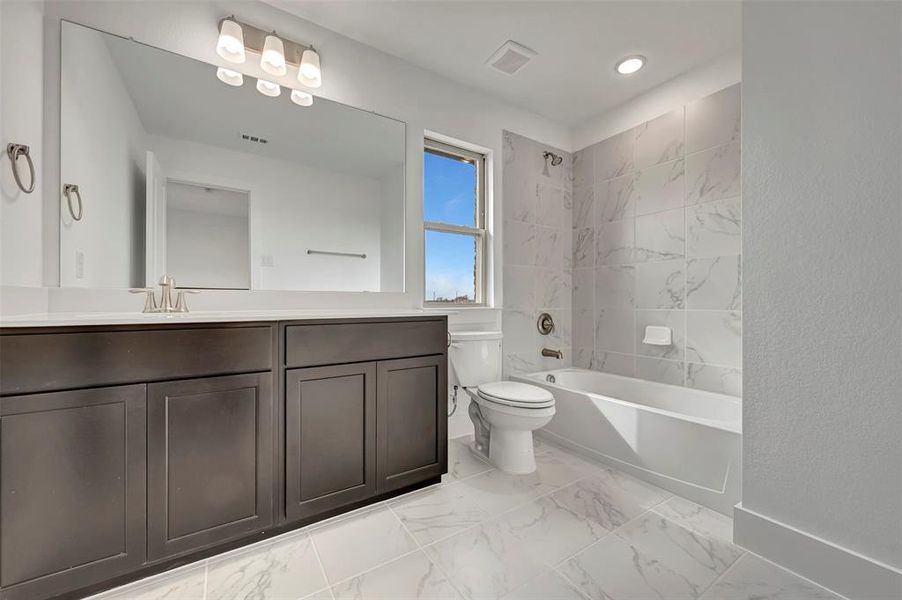 Furnished interior view inside a new home in Lily Creek at Sutton Fields, Aubrey (Image 18).