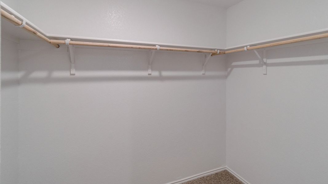 Representative unfurnished interior of a home built from the The Caprock by D.R. Horton in Watermill, Uhland (Image 14).