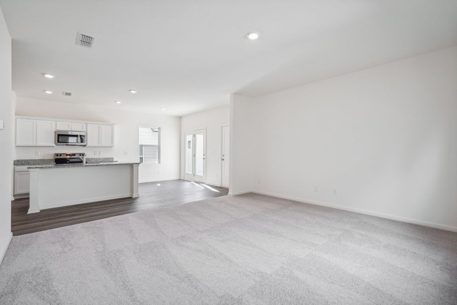Representative unfurnished interior of a home built from the Eris by Starlight Homes in Brookshire at Legacy Hills, Celina (Image 19). Representative unfurnished interior of a home built from the Eris by Starlight Homes in Brookshire at Legacy Hills, Celina (Image 19).