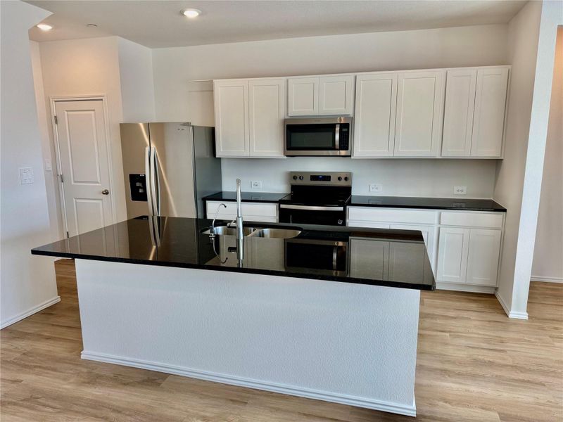 Furnished interior view inside a new home in Waterstone Village, Kyle (Image 4).