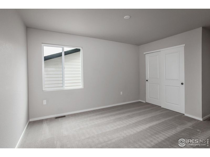 Spacious, unfurnished interior of a new home in Granary Trailblazer Collection - Single Family Homes, Johnstown (Image 32).