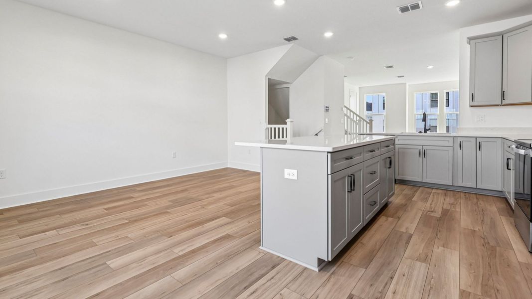 Furnished interior view inside a new home in Parkview at Hamlin, Winter Garden (Image 13).