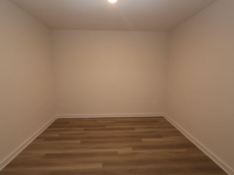 Spacious, unfurnished interior of a new home in Pinewood at Grand Texas, New Caney (Image 11).