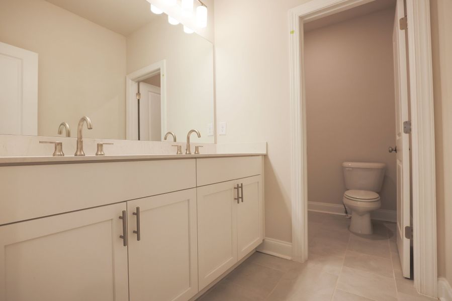 Representative furnished interior of a home built from the The Bennett by The Providence Group in Aberdeen, Hoschton (Image 15).