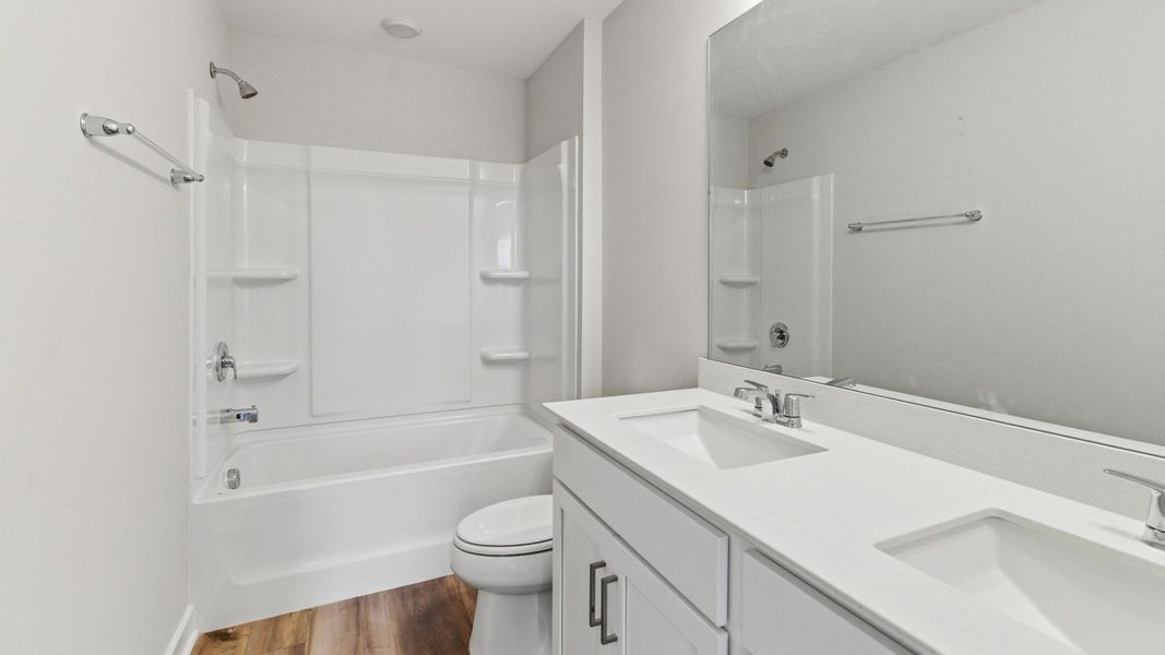 Bathroom with hard surface flooring