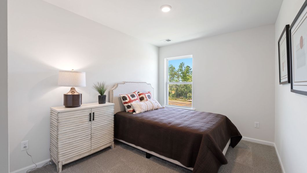 Furnished interior view inside a new home in Tanglewood Townes, Greenville (Image 18).
