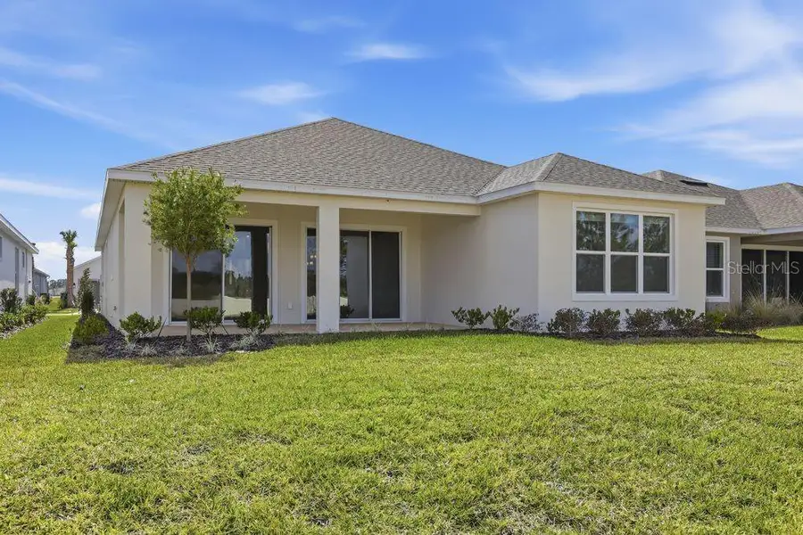 Exterior details and patio area of a home in Center Lake Ranch Community Group Page, St. Cloud (Image 3).