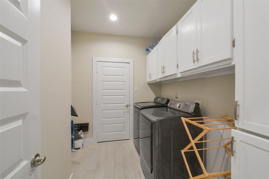 Functional utility room with convenient storage space.