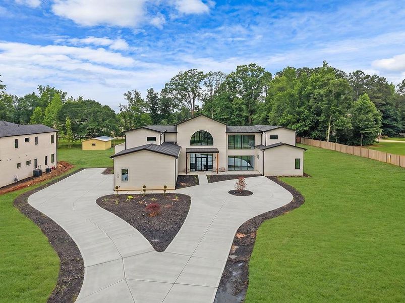 Front exterior of a new home in , Marietta, GA, highlighting curb appeal (Image 28).