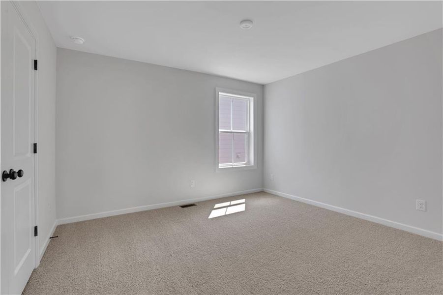 Spacious, unfurnished interior of a new home in Poppy at GreenHouse, Marietta (Image 12).