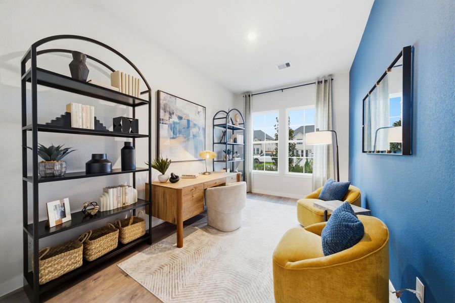 A living room with a blue wall. A living room with a blue wall.