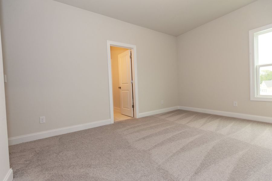 Representative unfurnished interior of a home built from the The Owens by The Providence Group in Waterhaven, Cumming (Image 46).