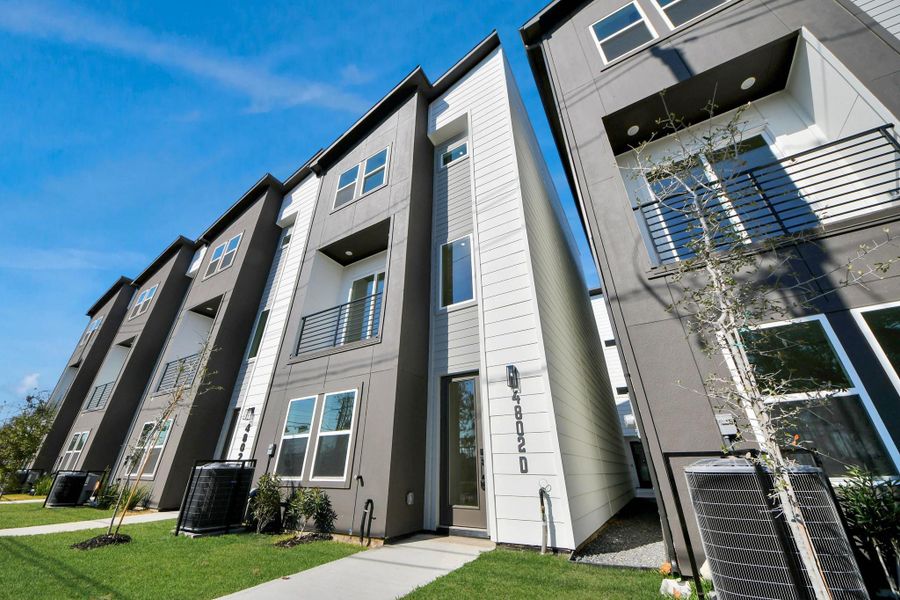 Front exterior of a new home in , Houston, TX, highlighting curb appeal (Image 27).