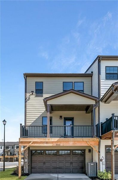 Front exterior of a new home in , Lawrenceville, GA, highlighting curb appeal (Image 17).
